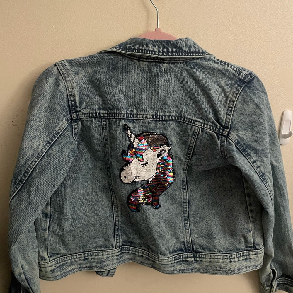 Girls size 10/12 denim jacket. Never worn.